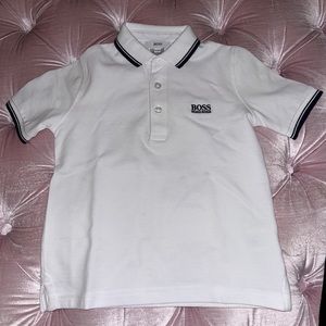 Hugo Boss boys polo t-shirt. Size 4. White with navy trim. Good condition.